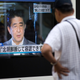 A pedestrian watches a monitor showing an image of Japanese Prime Minister Shinzo Abe in a news program reporting on North Korea’s 6th nuclear test on September 3, 2017 in Tokyo, Japan. (Photo by Tomohiro Ohsumi/Getty Images)